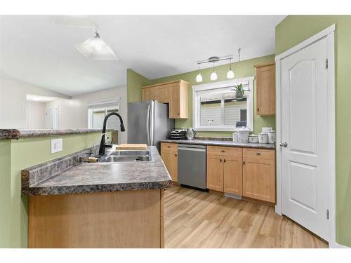 8812 85 Avenue, Grande Prairie, AB - Indoor Photo Showing Kitchen With Double Sink