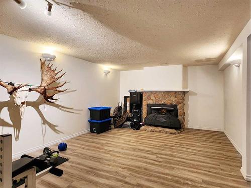 9817 102 Street, Grande Cache, AB - Indoor With Fireplace