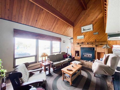 4431 45A Avenue, Rycroft, AB - Indoor Photo Showing Living Room With Fireplace