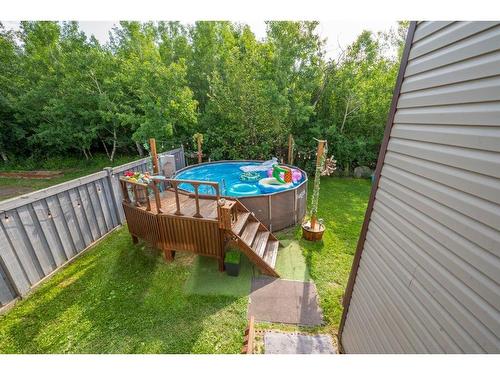 8005 112 Street, Grande Prairie, AB - Outdoor With Above Ground Pool
