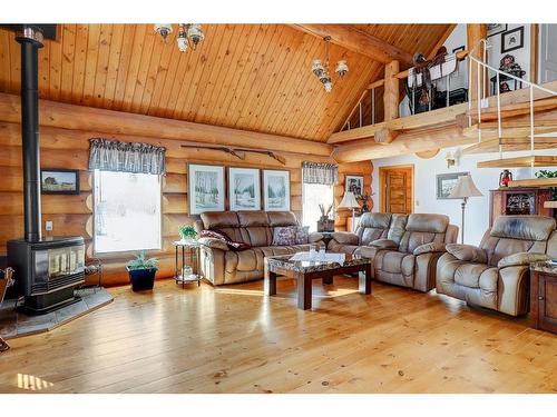 824026 64 Highway, Rural Fairview No. 136, M.D. Of, AB - Indoor Photo Showing Living Room With Fireplace