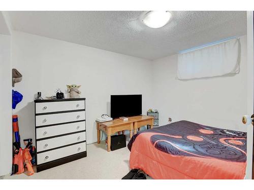 9851 80 Avenue, Grande Prairie, AB - Indoor Photo Showing Bedroom