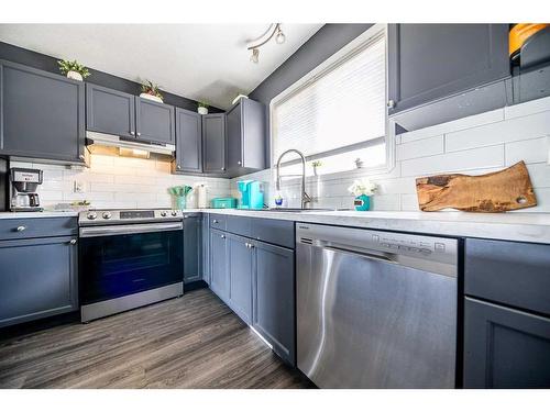 L102-8640 103 Avenue, Grande Prairie, AB - Indoor Photo Showing Kitchen