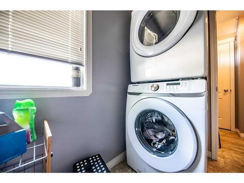 L102-8640 103 Avenue, Grande Prairie, AB - Indoor Photo Showing Laundry Room