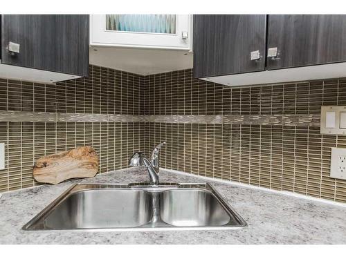 10107 92A Street, Grande Prairie, AB - Indoor Photo Showing Kitchen With Double Sink
