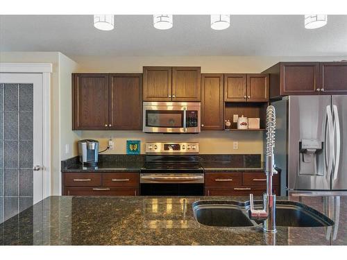 10938 60 Avenue, Grande Prairie, AB - Indoor Photo Showing Kitchen With Stainless Steel Kitchen With Double Sink