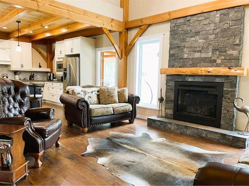 11608 120 Avenue Close, Fairview, AB - Indoor Photo Showing Living Room With Fireplace