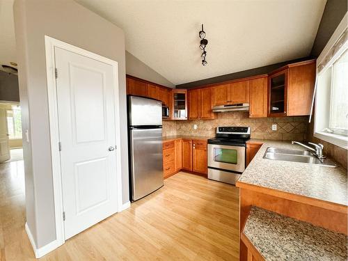 9129 94A Avenue, Grande Prairie, AB - Indoor Photo Showing Kitchen With Double Sink