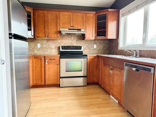 9129 94A Avenue, Grande Prairie, AB - Indoor Photo Showing Kitchen With Double Sink