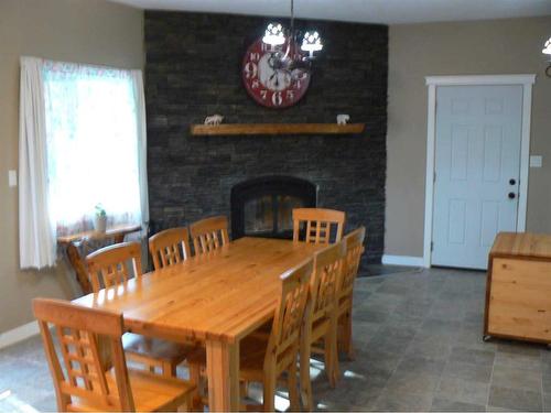 19520 730 Township, High Prairie, AB - Indoor Photo Showing Dining Room With Fireplace