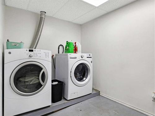 9801 103 Street, Grande Cache, AB - Indoor Photo Showing Laundry Room