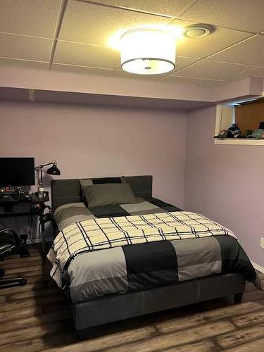 37 Bjornson Avenue, High Level, AB - Indoor Photo Showing Bedroom