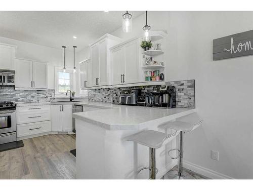 58 Sunset Drive, Spirit River, AB - Indoor Photo Showing Kitchen With Upgraded Kitchen