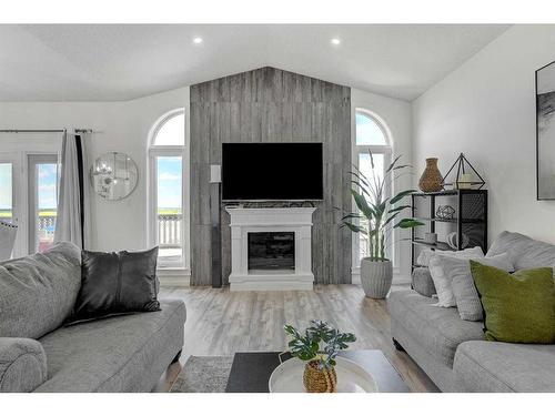 58 Sunset Drive, Spirit River, AB - Indoor Photo Showing Living Room With Fireplace