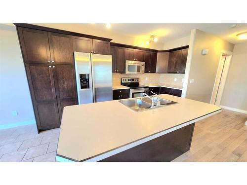 8218 113 Street, Grande Prairie, AB - Indoor Photo Showing Kitchen With Double Sink