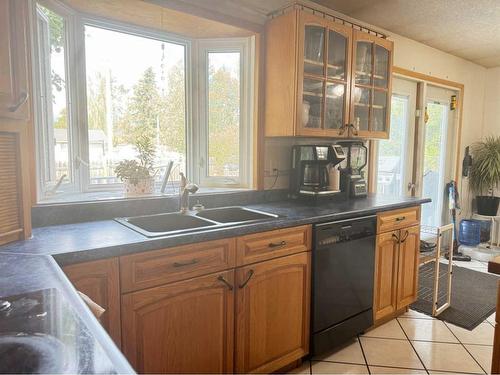 11414 Norris Crescent, Grande Cache, AB - Indoor Photo Showing Kitchen With Double Sink