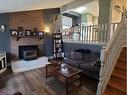 5405 52 Street, Berwyn, AB  - Indoor Photo Showing Living Room With Fireplace 