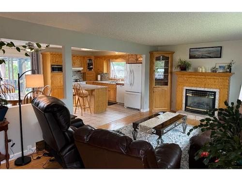 924 4 Avenue, Hines Creek, AB - Indoor Photo Showing Living Room With Fireplace