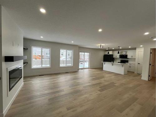 8646 121 Avenue, Grande Prairie, AB - Indoor Photo Showing Other Room With Fireplace