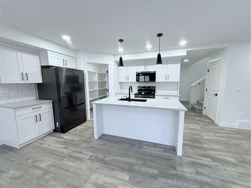 8653 122 Avenue, Grande Prairie, AB - Indoor Photo Showing Kitchen