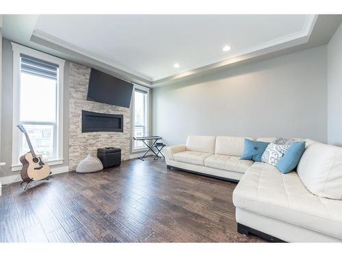 8938 94 Avenue, Grande Prairie, AB - Indoor Photo Showing Living Room With Fireplace