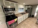 9604 96 Street, Peace River, AB  - Indoor Photo Showing Kitchen With Double Sink 