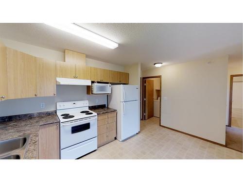 206-12015 Royal Oaks Drive, Grande Prairie, AB - Indoor Photo Showing Kitchen