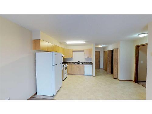 300-12015 Royal Oaks Drive, Grande Prairie, AB - Indoor Photo Showing Kitchen