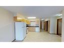 300-12015 Royal Oaks Drive, Grande Prairie, AB  - Indoor Photo Showing Kitchen 