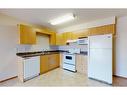 302-12015 Royal Oaks Drive, Grande Prairie, AB  - Indoor Photo Showing Kitchen With Double Sink 