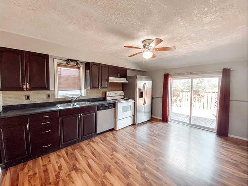 5105 44 Avenue, Spirit River, AB - Indoor Photo Showing Kitchen With Double Sink