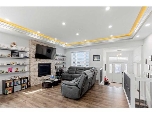 7049 85 Street, Grande Prairie, AB - Indoor Photo Showing Living Room With Fireplace