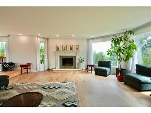 10010 89 Street, Peace River, AB - Indoor Photo Showing Living Room With Fireplace