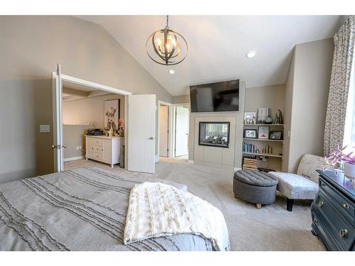 15225 104A Street, Rural Grande Prairie No. 1, County Of, AB - Indoor Photo Showing Bedroom With Fireplace