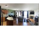 7021 112 Street, Grande Prairie, AB  - Indoor Photo Showing Living Room With Fireplace 