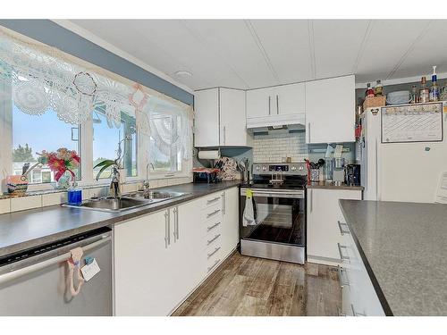 724006 Range Road 45, Rural Grande Prairie No. 1, County Of, AB - Indoor Photo Showing Kitchen With Double Sink