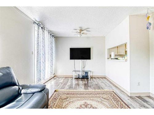 104-9740 82 Avenue, Grande Prairie, AB - Indoor Photo Showing Living Room