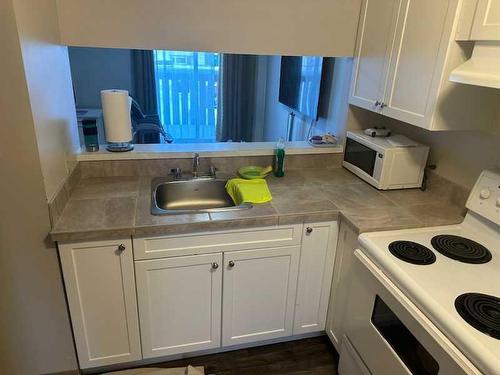 104-9740 82 Avenue, Grande Prairie, AB - Indoor Photo Showing Kitchen