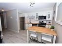 C6-9503 88 Avenue, Peace River, AB  - Indoor Photo Showing Kitchen 