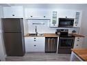 C6-9503 88 Avenue, Peace River, AB  - Indoor Photo Showing Kitchen With Double Sink 