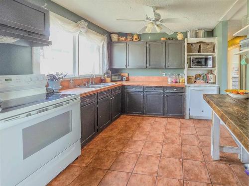 9706 104 Street, Grande Cache, AB - Indoor Photo Showing Kitchen With Double Sink