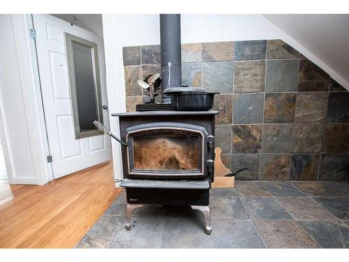 64024 Township Road 703A, Rural Grande Prairie No. 1, County Of, AB - Indoor With Fireplace