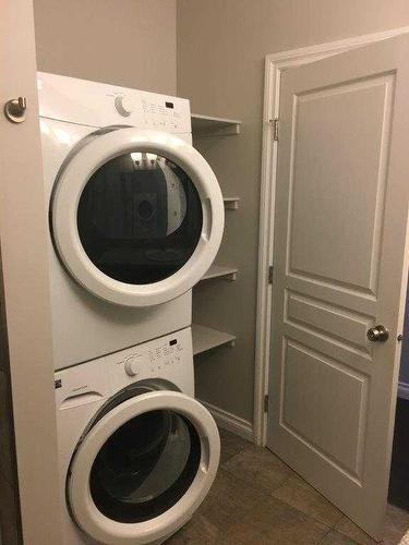 A & B-10217 106 Avenue, Grande Prairie, AB - Indoor Photo Showing Laundry Room