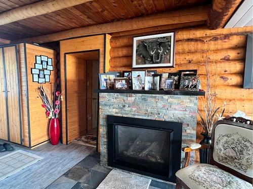 23144 Twp Rd 712, Rural Greenview No. 16, M.D. Of, AB - Indoor Photo Showing Living Room With Fireplace