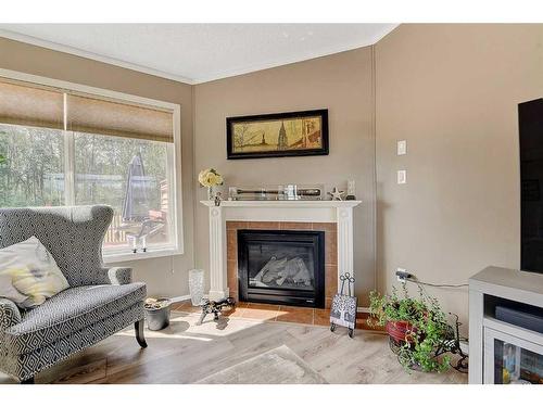 730073 Range Road 91, Rural Grande Prairie No. 1, County Of, AB - Indoor Photo Showing Living Room With Fireplace