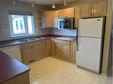 11125 108 Avenue, Fairview, AB  - Indoor Photo Showing Kitchen With Double Sink 