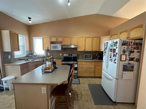 142 Pinnacle Avenue, Grande Prairie, AB - Indoor Photo Showing Kitchen With Double Sink