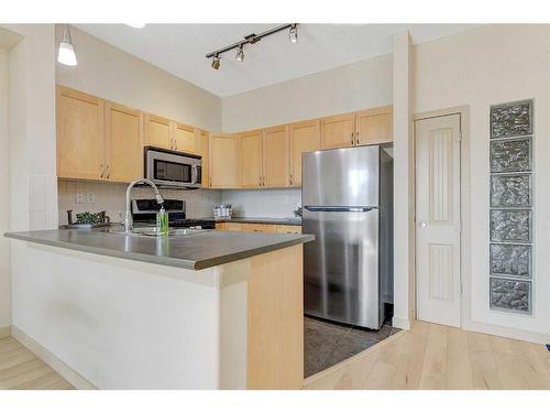 216-12320 102 Street, Grande Prairie, AB - Indoor Photo Showing Kitchen With Stainless Steel Kitchen