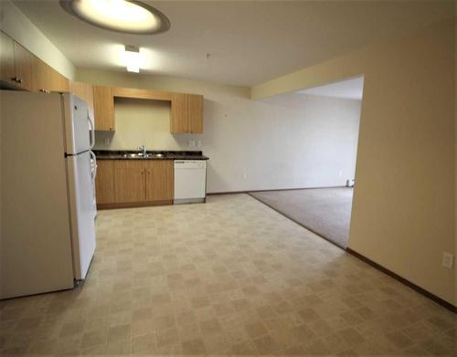 204-12015 Royal Oaks Drive, Grande Prairie, AB - Indoor Photo Showing Kitchen