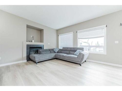 8810 88 Avenue, Grande Prairie, AB - Indoor Photo Showing Living Room With Fireplace